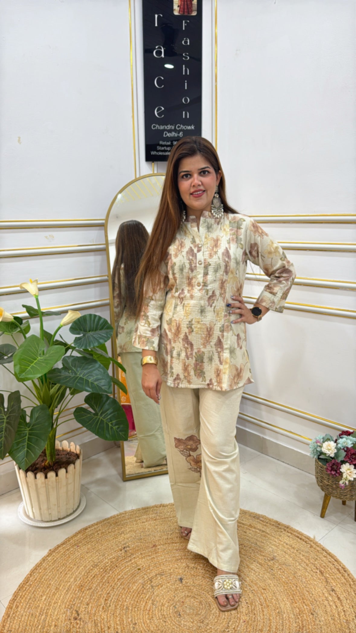 Pastel floral co-ord set featuring a blouse and matching pants, perfect for casual outings.